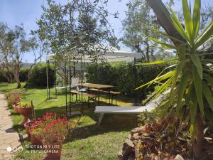 A garden outside Appartamenti in Villa