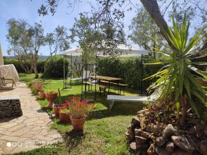 A garden outside Appartamenti in Villa