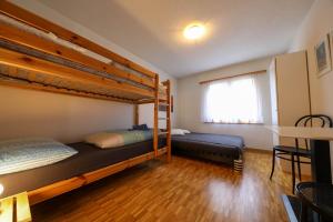Postel nebo postele na pokoji v ubytování Heavenly