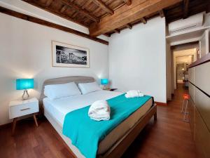 Ένα ή περισσότερα κρεβάτια σε δωμάτιο στο Farnese Charme