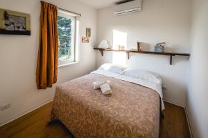 A bed or beds in a room at Colle Regnano