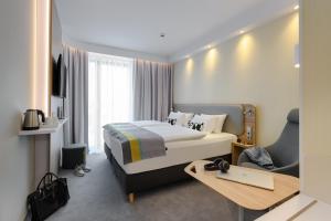 Postel nebo postele na pokoji v ubytování Holiday Inn Express - Fulda by IHG