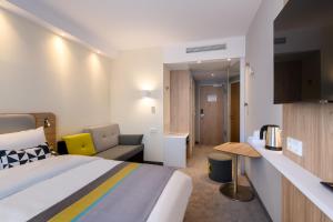 Postel nebo postele na pokoji v ubytování Holiday Inn Express - Fulda by IHG