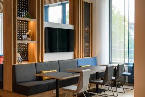 TV a/nebo společenská místnost v ubytování Holiday Inn Express - Fulda by IHG