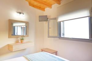 Saronic View客房内的一张或多张床位