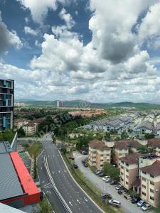 an aerial view of a city with a road and buildings at DanZaStay2@CoreSoHo - nearby KLIA in Sepang
