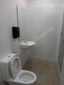 a bathroom with a toilet and a sink at DanZaStay2@CoreSoHo - nearby KLIA in Sepang +15 photos