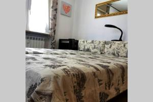 Postel nebo postele na pokoji v ubytování Appartamento Chatillon