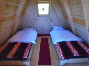מיטה או מיטות בחדר ב-Glamping MM