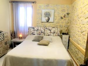 Ліжко або ліжка в номері Lazareto Villa
