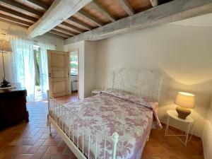 A bed or beds in a room at Il frantoio di Luna - Levanto, 5 Terre