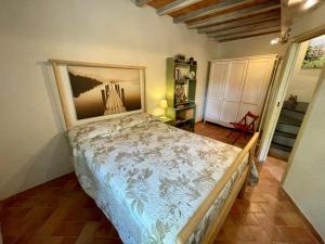A bed or beds in a room at Il frantoio di Luna - Levanto, 5 Terre