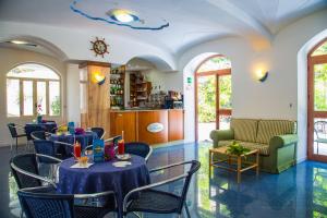 Гостиная зона в Hotel La Mandorla