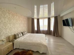 מיטה או מיטות בחדר ב-Baltic dream Apartments