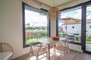 A balcony or terrace at OCEANSUITESLANGRE