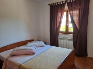 Postel nebo postele na pokoji v ubytování N&G Apartments