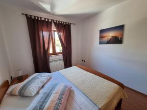 Postel nebo postele na pokoji v ubytování N&G Apartments