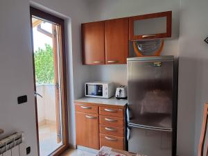 Kuchyň nebo kuchyňský kout v ubytování N&G Apartments