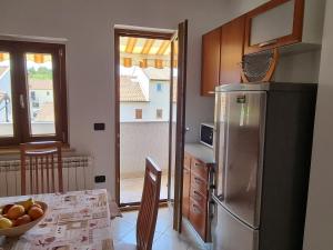 Kuchyň nebo kuchyňský kout v ubytování N&G Apartments