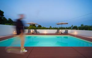 Bazén v ubytovaní Villa Relax Figurella alebo v jeho blízkosti
