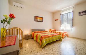 Posteľ alebo postele v izbe v ubytovaní Villa Relax Figurella