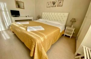 Postel nebo postele na pokoji v ubytování hotel lisà