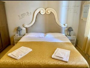 Postel nebo postele na pokoji v ubytování hotel lisà
