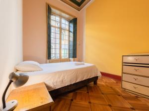 Postel nebo postele na pokoji v ubytování Hostal R10