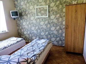 Postel nebo postele na pokoji v ubytování Jacek i Agatka