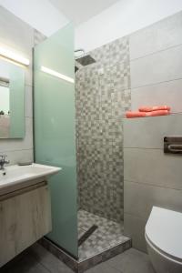 Koupelna v ubytování Dimitra Faliraki Center Apartments