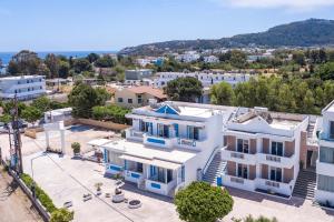 an aerial view of a city with white houses at Dimitra Faliraki Center Apartments in Faliraki