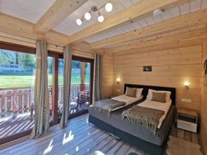 Posteľ alebo postele v izbe v ubytovaní Tauern Appartements