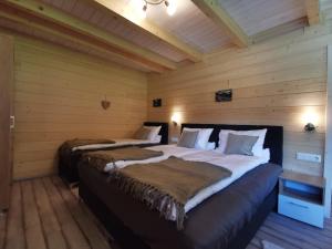 Posteľ alebo postele v izbe v ubytovaní Tauern Appartements