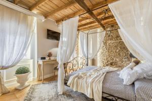 Giường trong phòng chung tại Sweet Holidays - Lerici e 5 Terre