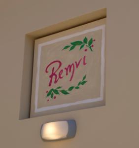 una imagen enmarcada de la palabra remix en una pared en REMVI Apartments Assos en Asos