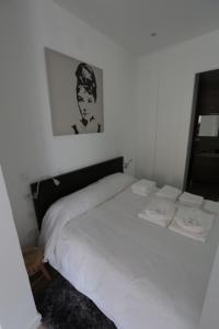 Las Infantas Zona Centro tesisinde bir odada yatak veya yataklar