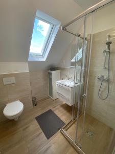 Kúpeľňa v ubytovaní Apartman Szanyi