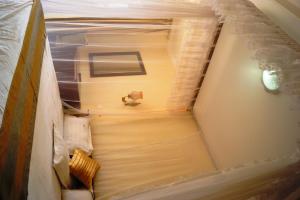 Postel nebo postele na pokoji v ubytování Tristar Hotel Kampala