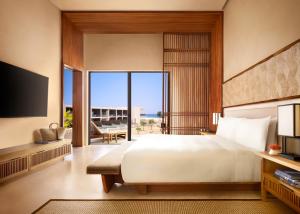 TV a/nebo společenská místnost v ubytování Nobu Hotel Los Cabos