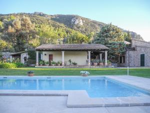 a swimming pool in front of a house at Villa en Valldemossa - 3434-49 Mallorca by 5StarsHome in Valldemossa