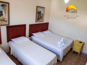 Postel nebo postele na pokoji v ubytování Pousada Por do Sol