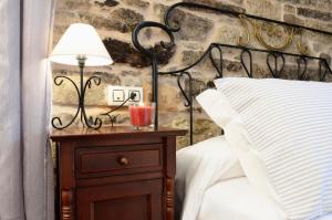 A bed or beds in a room at Sete Artes by Como en Casa