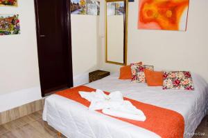 Кровать или кровати в номере Pousada das Acerolas