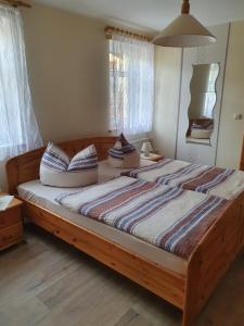 Postel nebo postele na pokoji v ubytování Ferienwohnung in der Sächsischen Schweiz