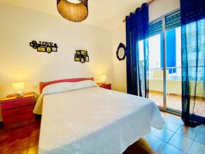 A bed or beds in a room at Dora Prado Mar II