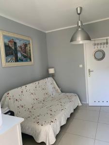 Postel nebo postele na pokoji v ubytování Domki i Apartamenty El-Piero