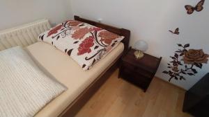 Postel nebo postele na pokoji v ubytování Apartmán U Špýcharu