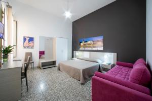 A bed or beds in a room at Terrazze Villanova