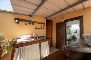 A bed or beds in a room at Terrazze Villanova