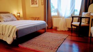 Posteľ alebo postele v izbe v ubytovaní Hotel Santa Coloma del Camino